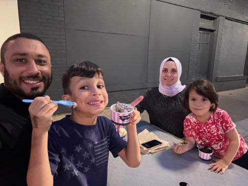 Bayan Alquran with her husband Alharith and children Hashim and Aya